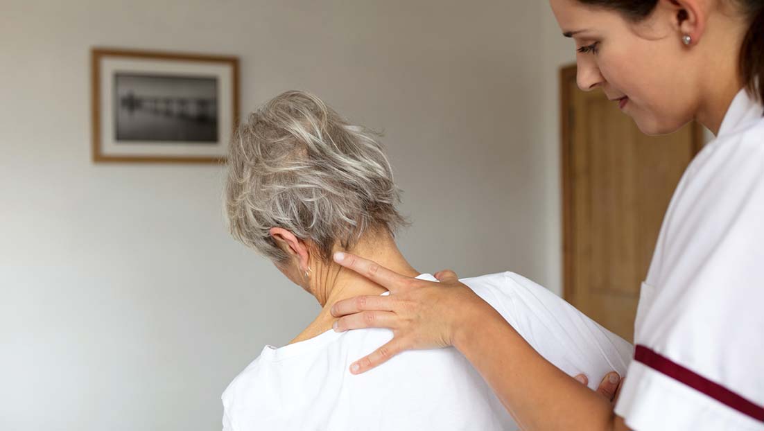 Shoulder pain: osteopath helping to relieve pain and stiffness in patient's shoulder